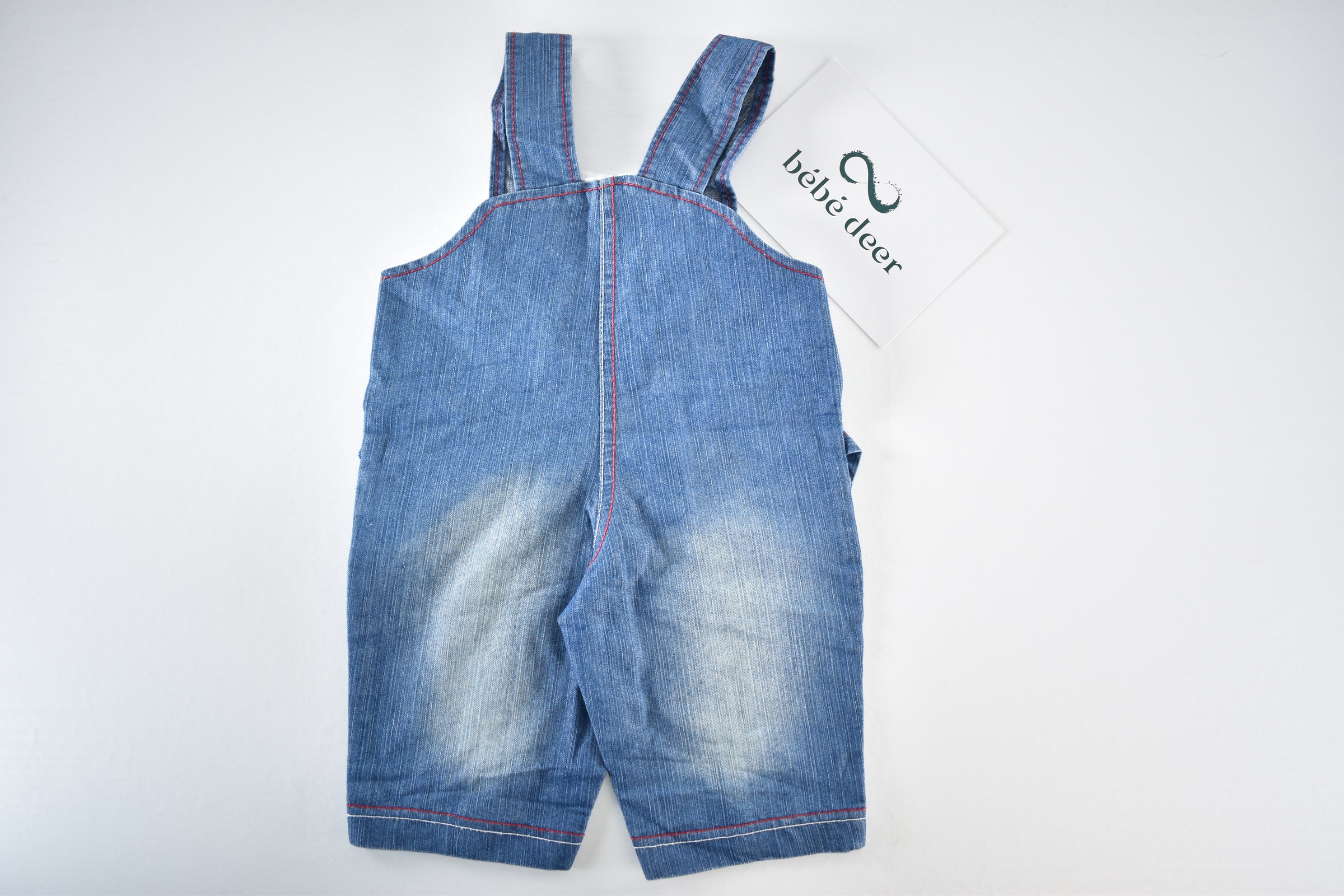 Denim dungarees with embroidered characters
