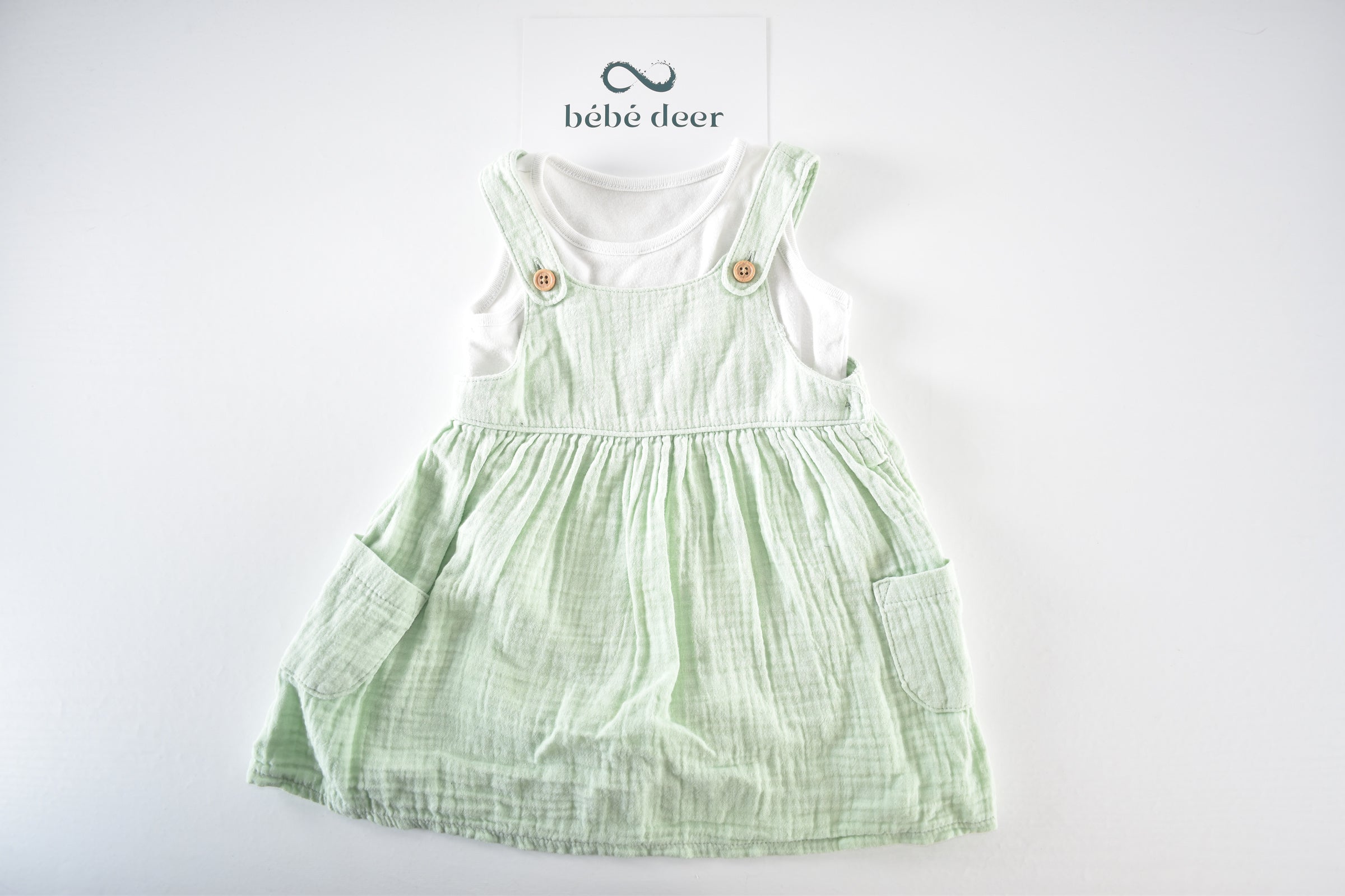 Pale green muslin dress and bodysuit set