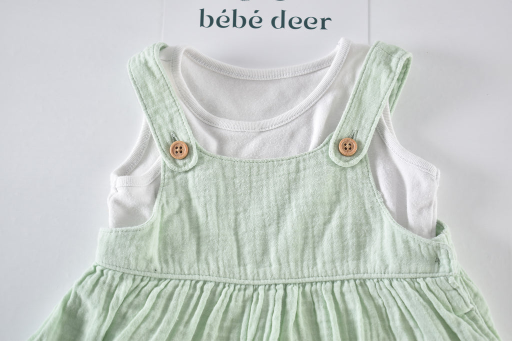 Pale green muslin dress and bodysuit set