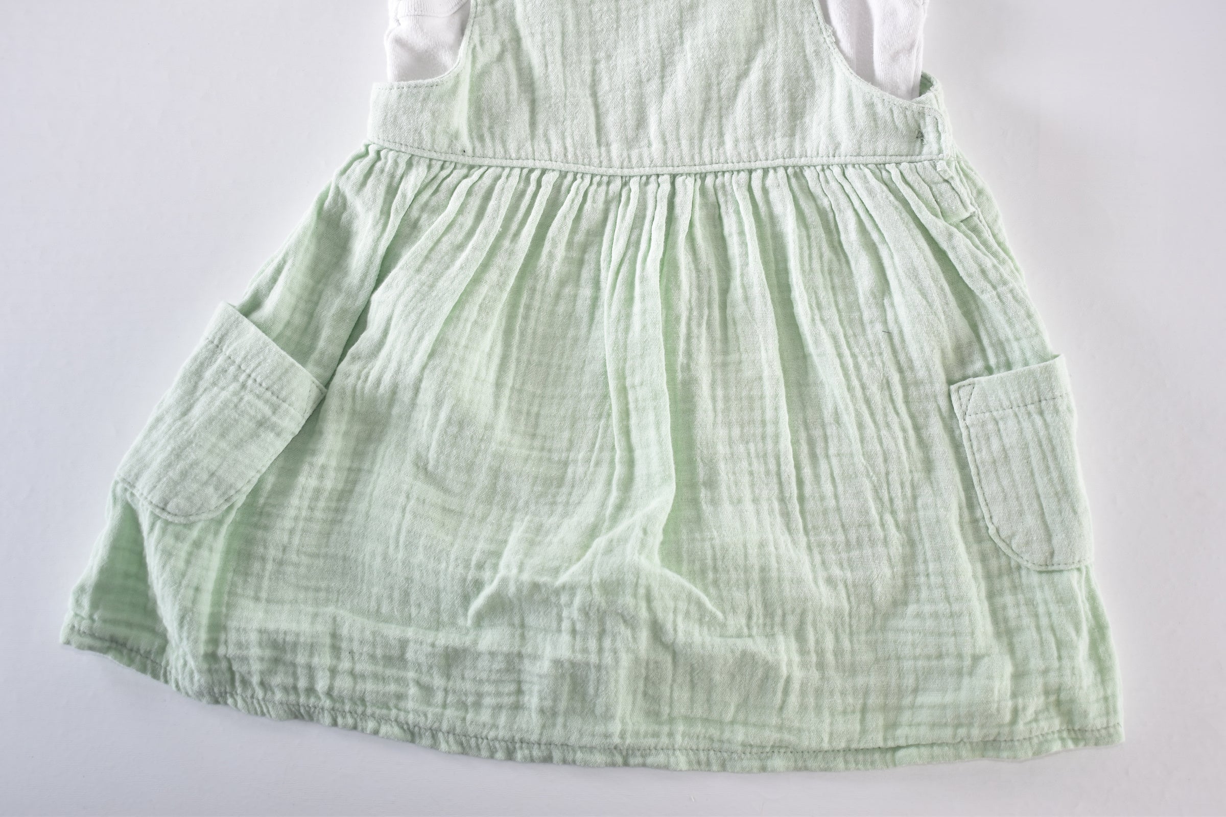 Pale green muslin dress and bodysuit set