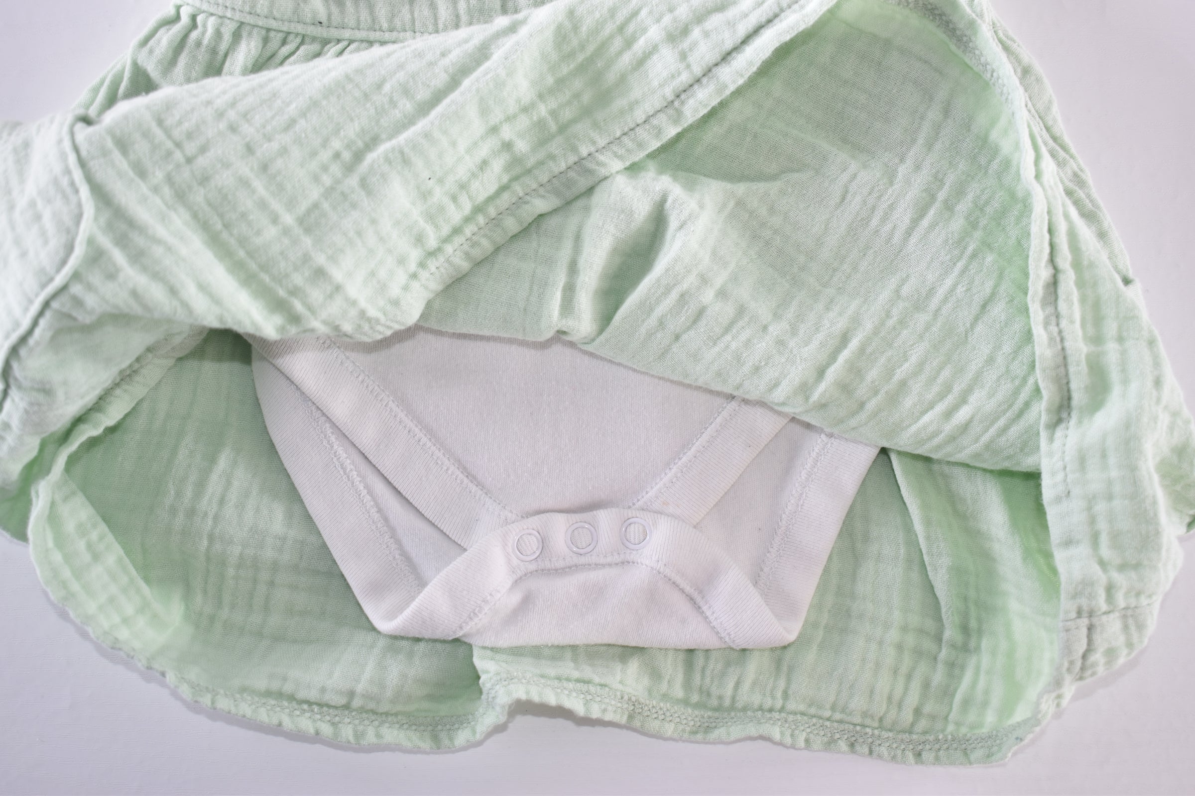 Pale green muslin dress and bodysuit set