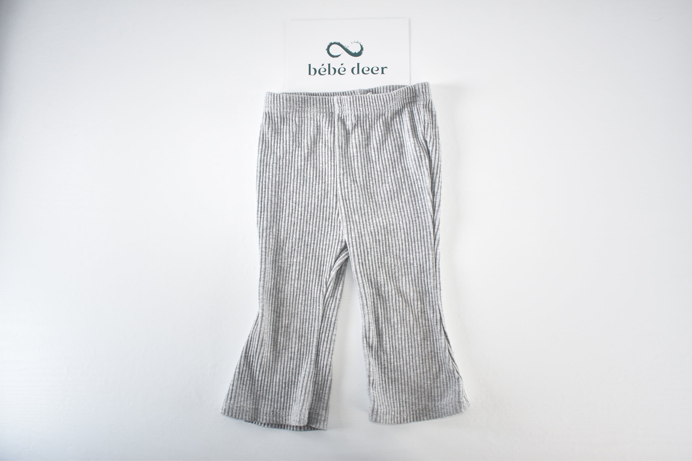 Grey ribbed flared trousers