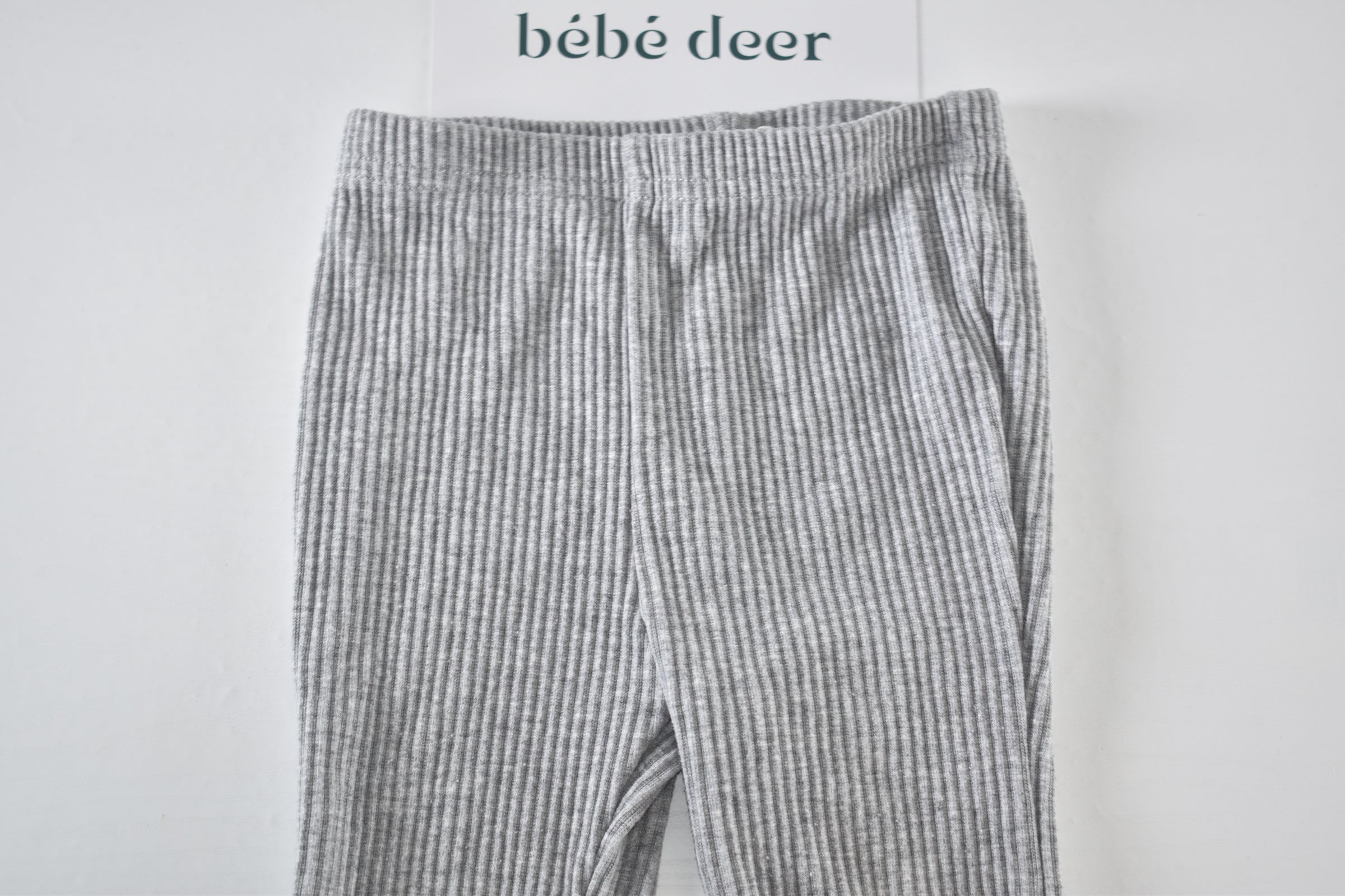 Grey ribbed flared trousers