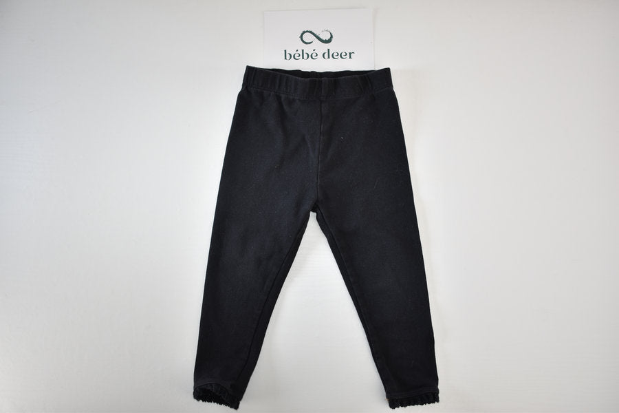 Black leggings with frill hem