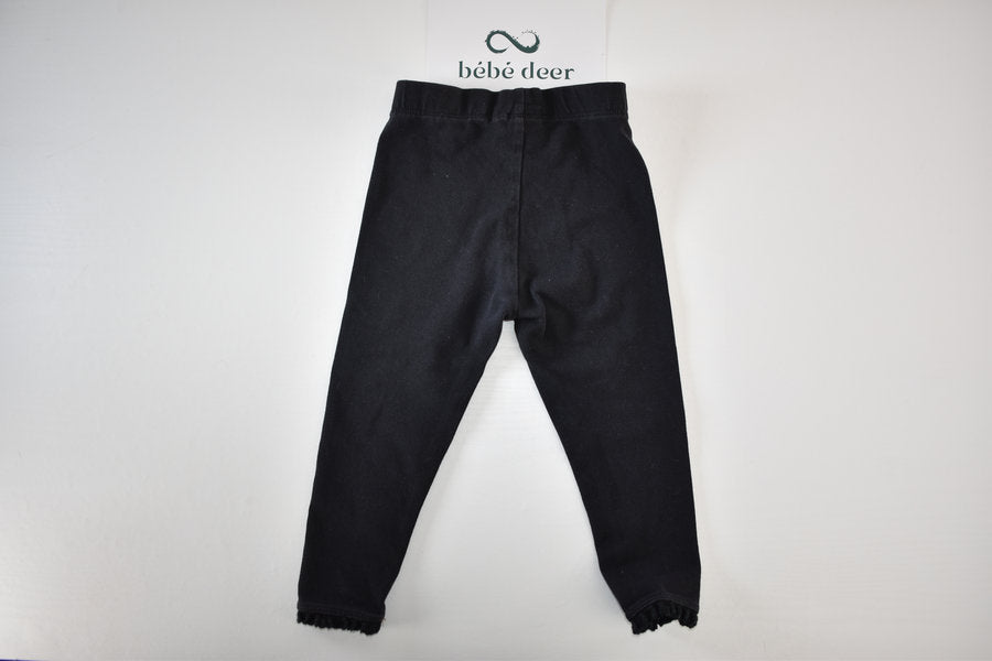 Black leggings with frill hem