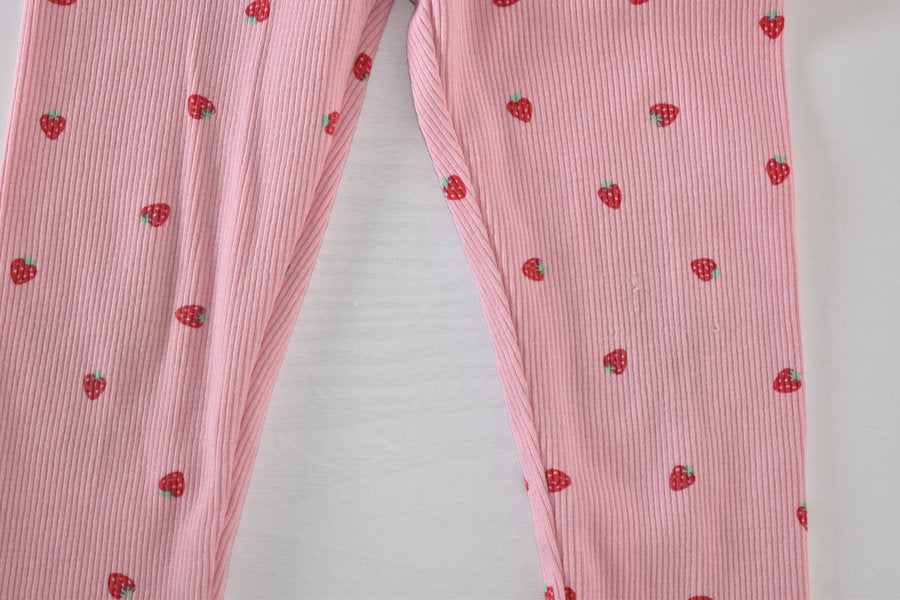 Legging rose à imprimé fraises
