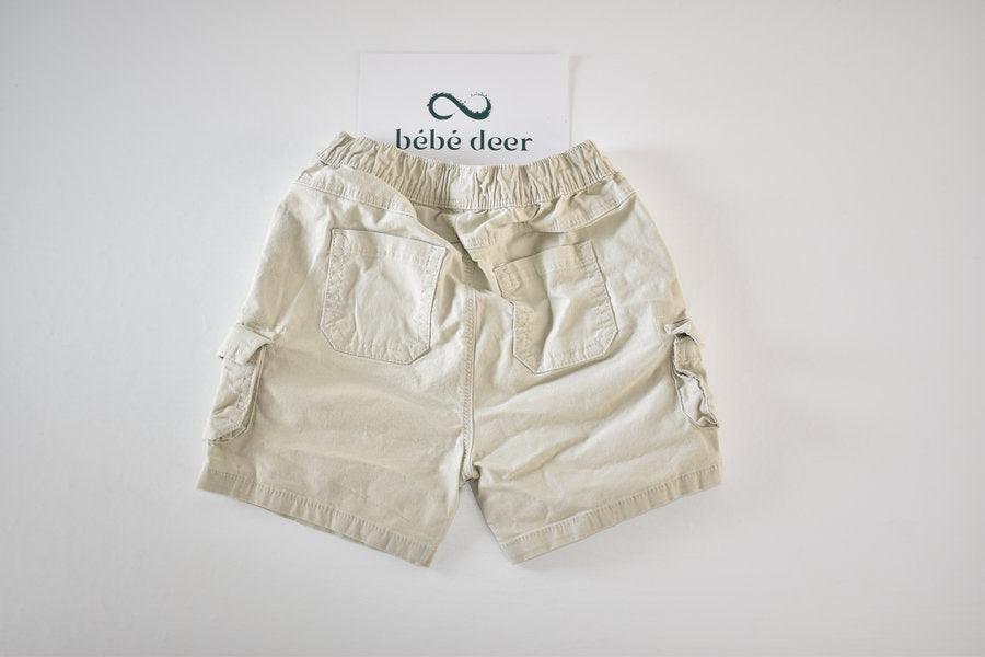 Pale grey cargo shorts with pockets
