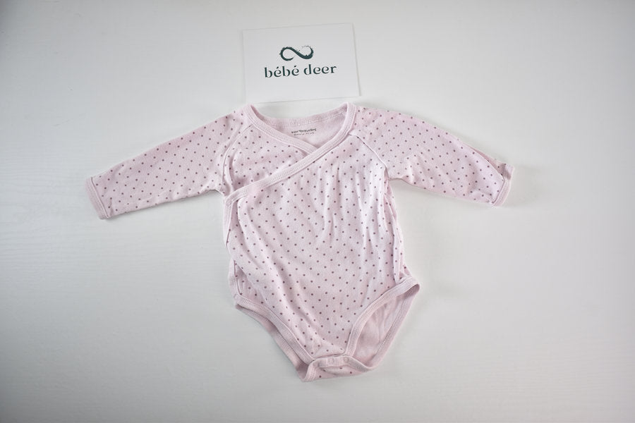 Pink wrap style polka dot bodysuit