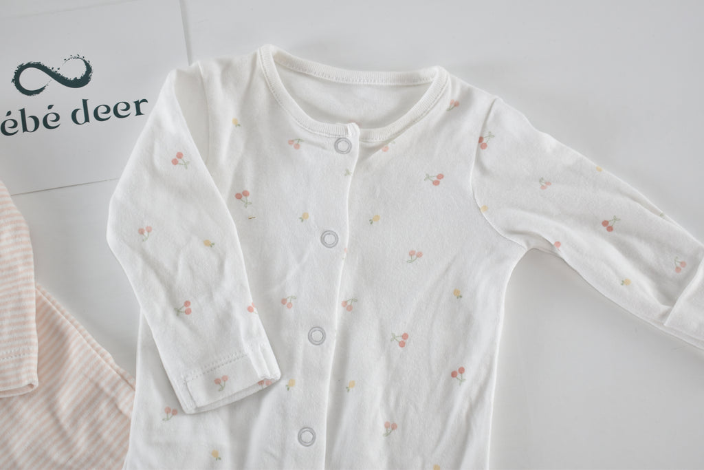 Set of 2 sleepsuits soft pink and white
