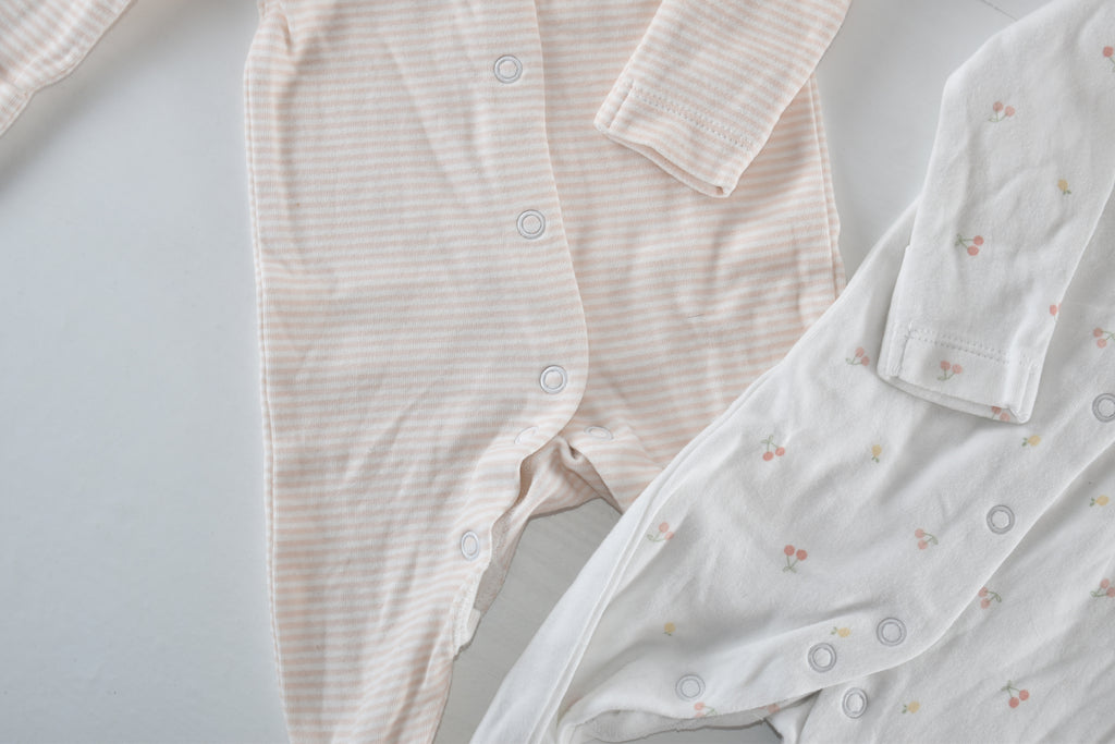 Set of 2 sleepsuits soft pink and white