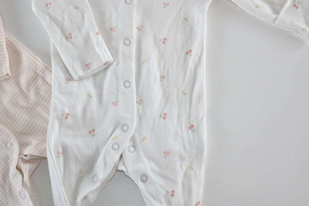 Set of 2 sleepsuits soft pink and white