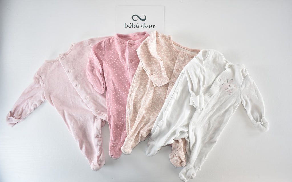 Set of 4 pink sleepsuits