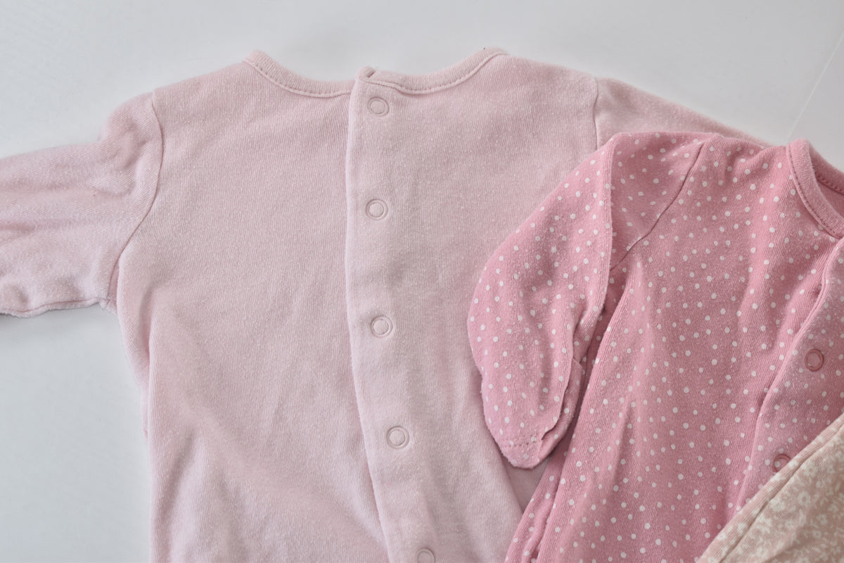 Set of 4 pink sleepsuits