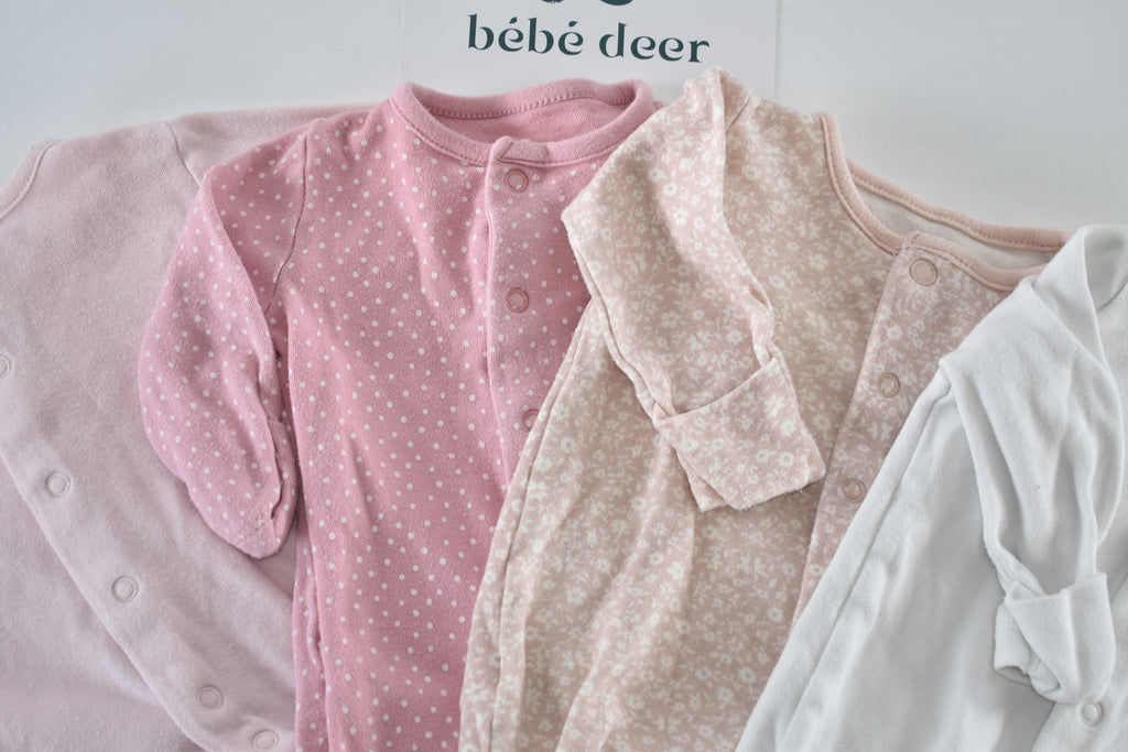 Set of 4 pink sleepsuits