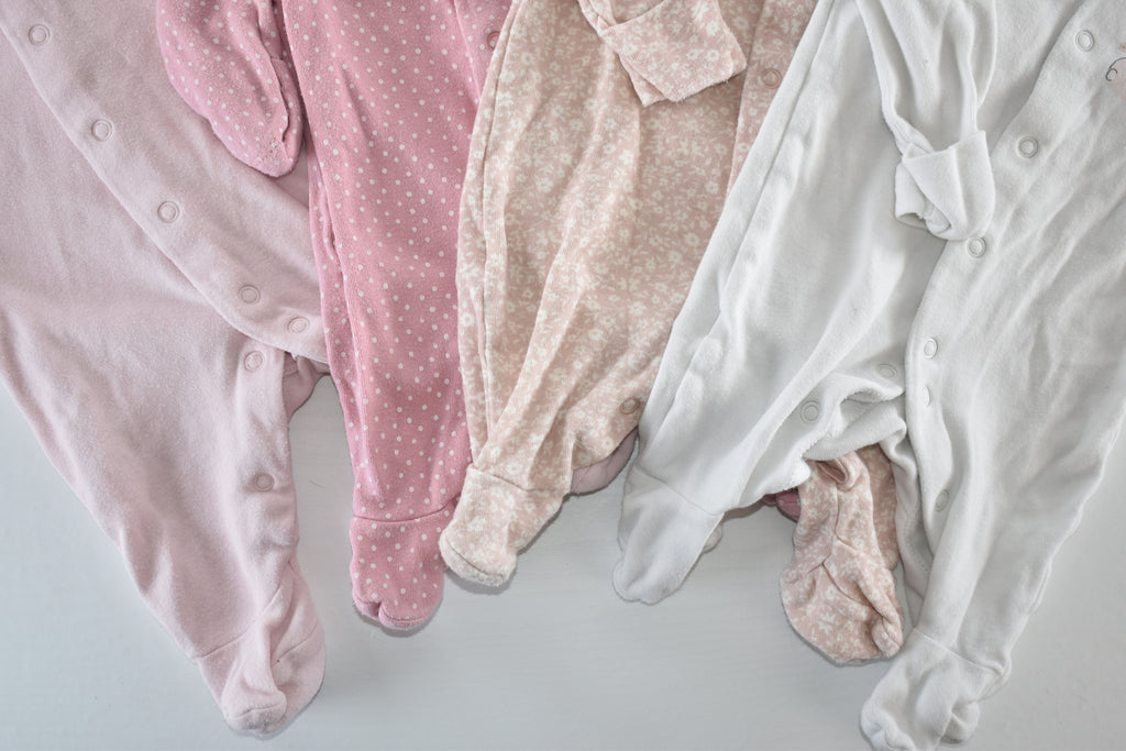 Set of 4 pink sleepsuits