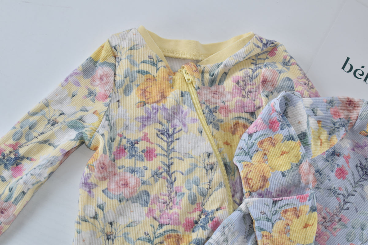 Set of 2 floral footless rompers