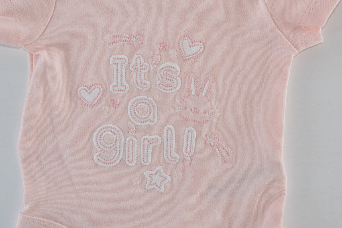 It’s a girl! pink bodysuit