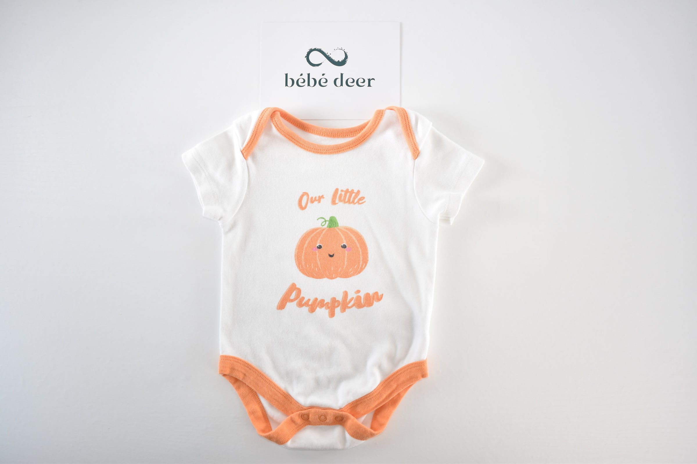 Halloween "Our Little Pumpkin" bodysuit with pumpkin print