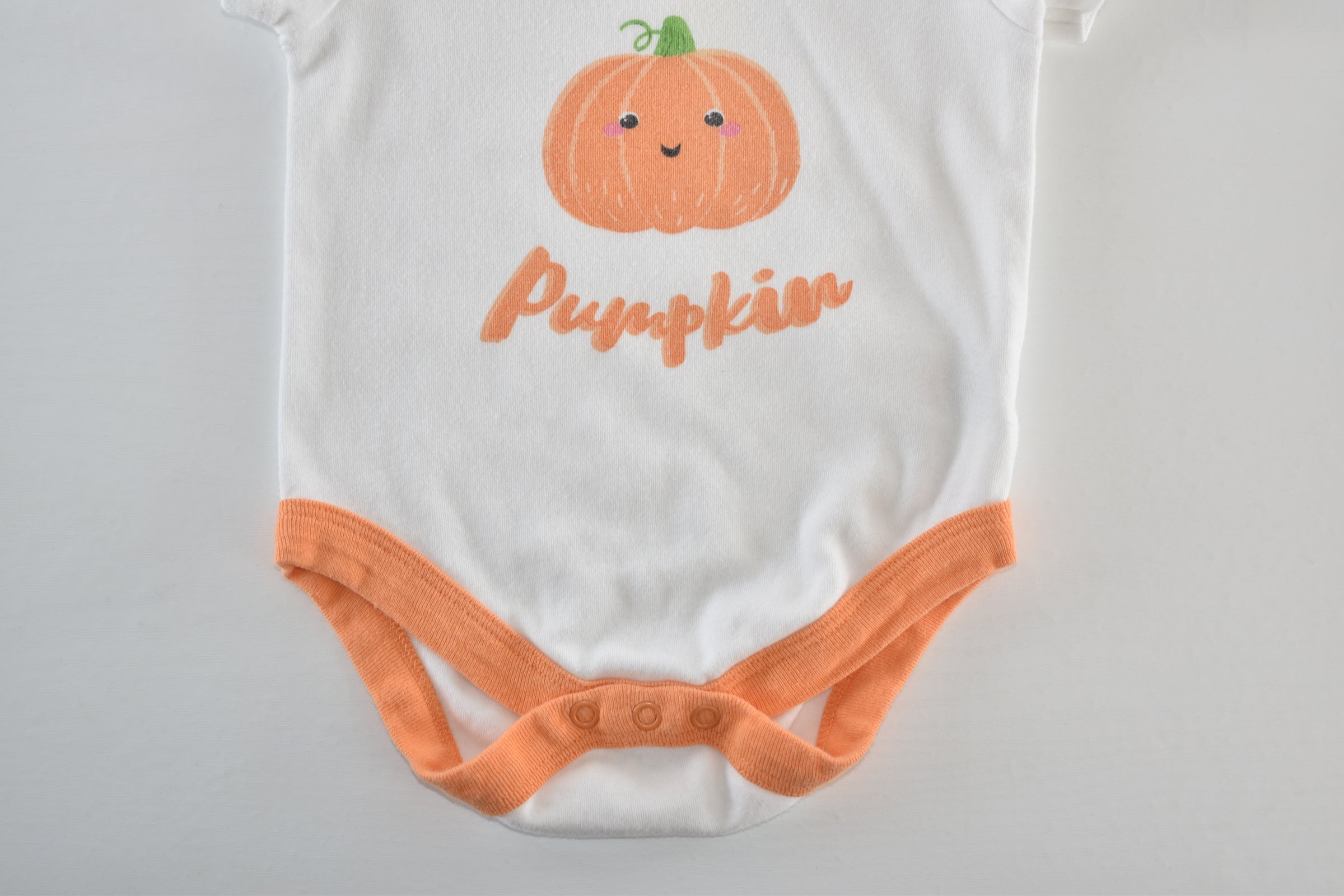 Halloween "Our Little Pumpkin" bodysuit with pumpkin print