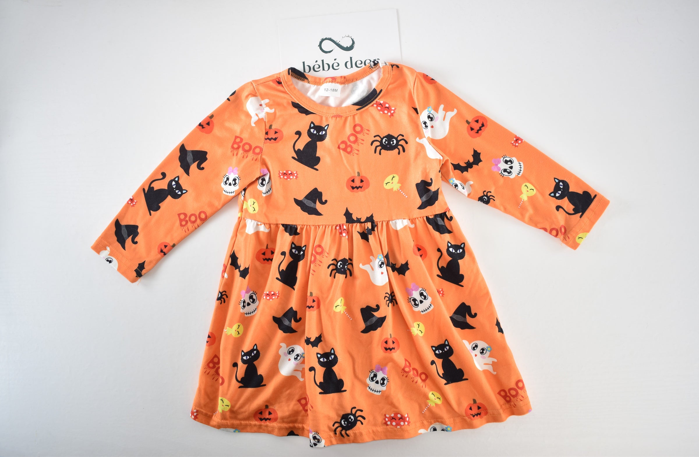 Halloween dress with black cats, ghosts and pumpkins