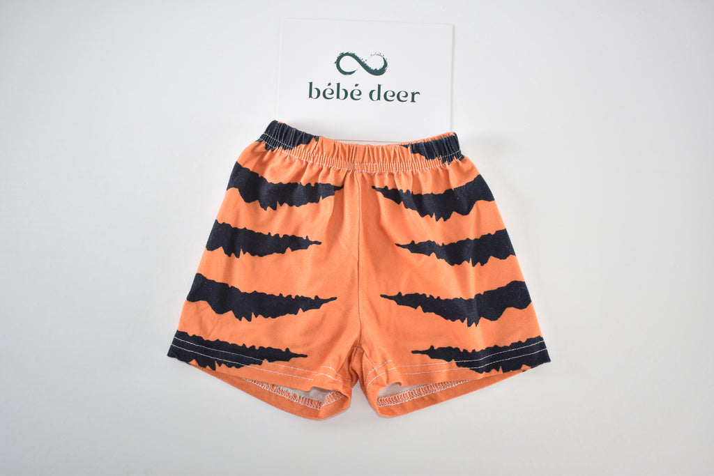 Halloween orange and black spooky stripe shorts