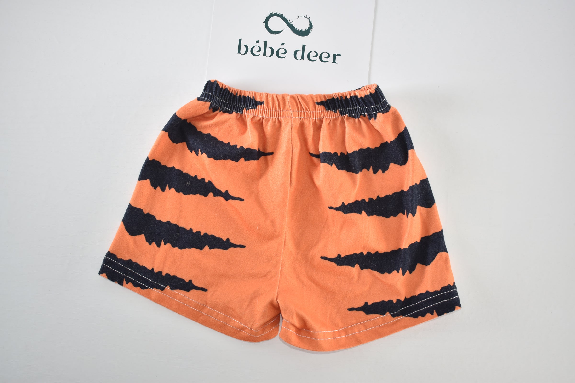 Halloween orange and black spooky stripe shorts