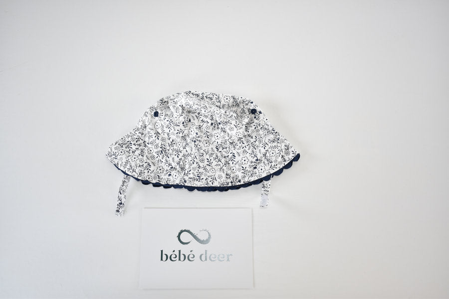 Floral sun hat with chin ties 3/6 months