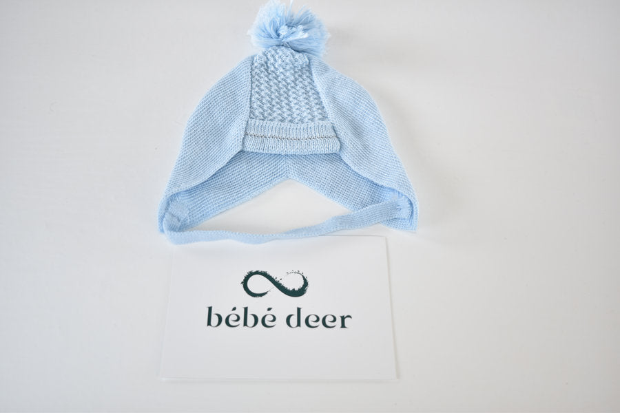 Handmade knitted bonnet with pom pom