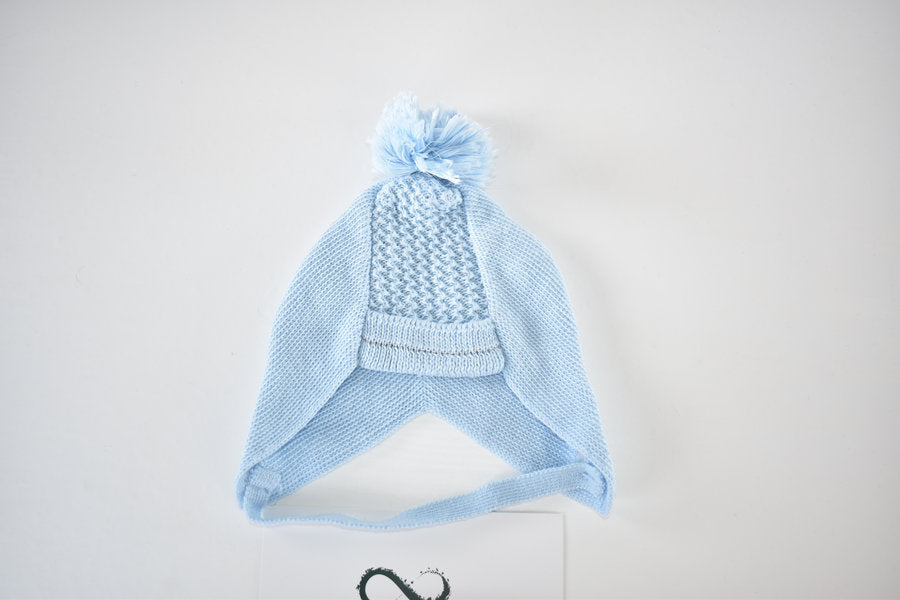 Handmade knitted bonnet with pom pom