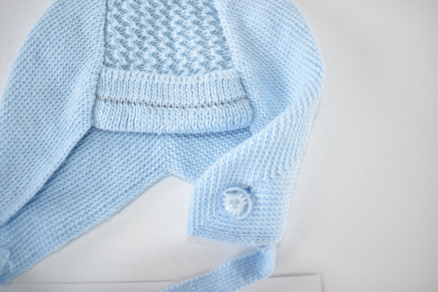 Handmade knitted bonnet with pom pom