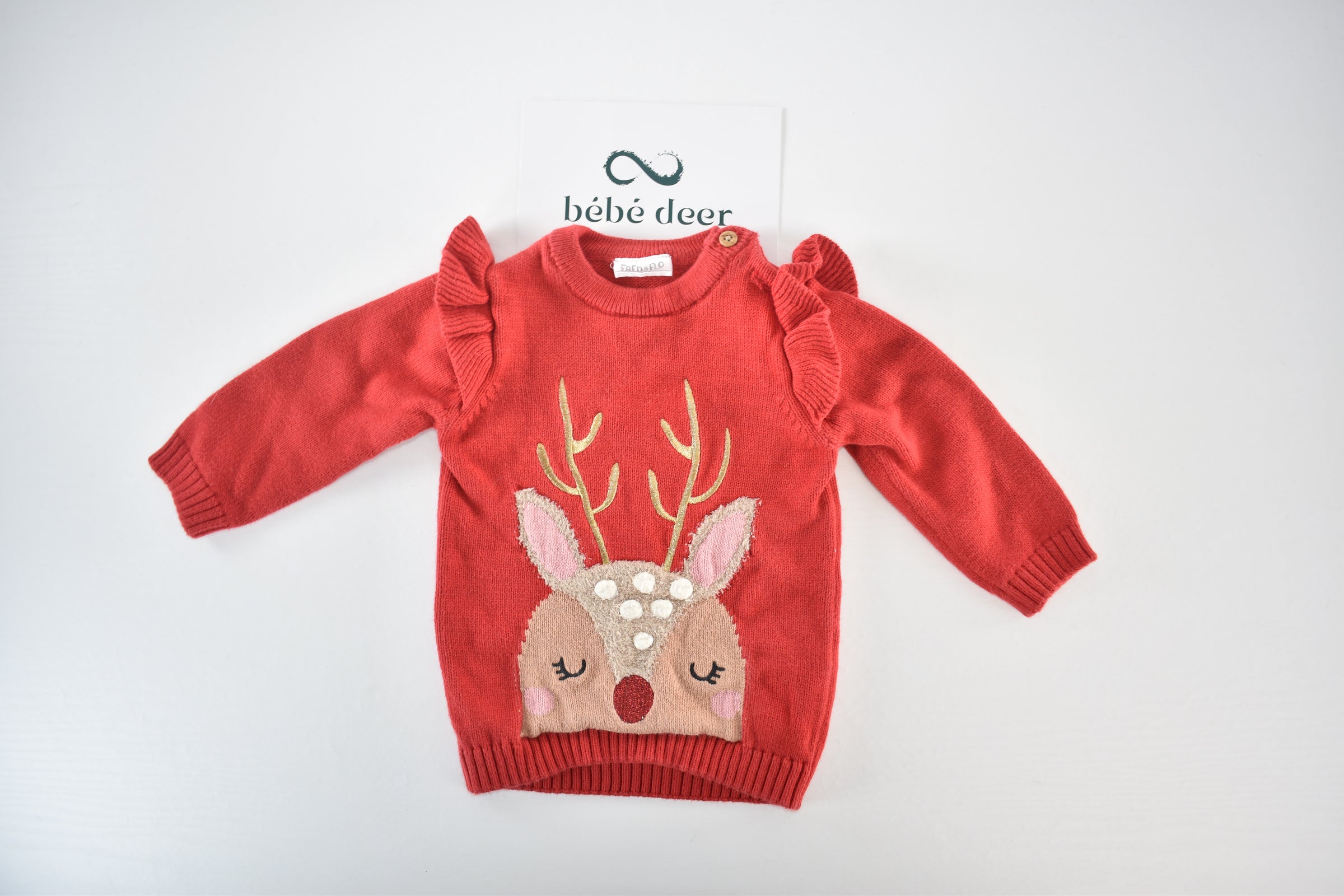 Christmas reindeer knitted jumper with ruffle shoulders