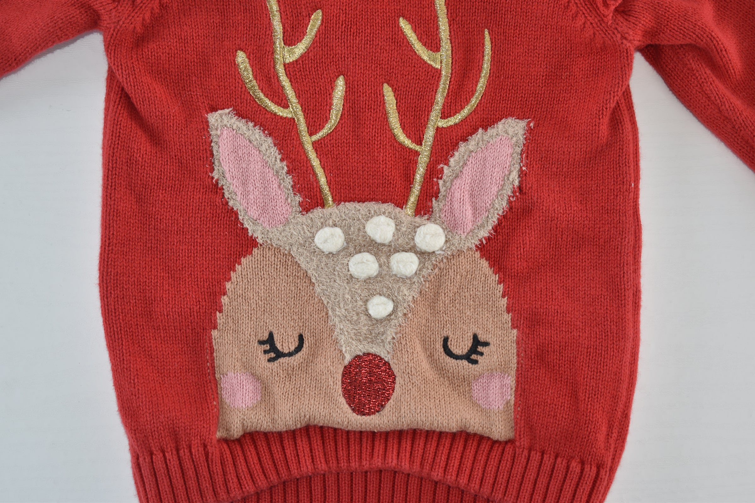 Christmas reindeer knitted jumper with ruffle shoulders