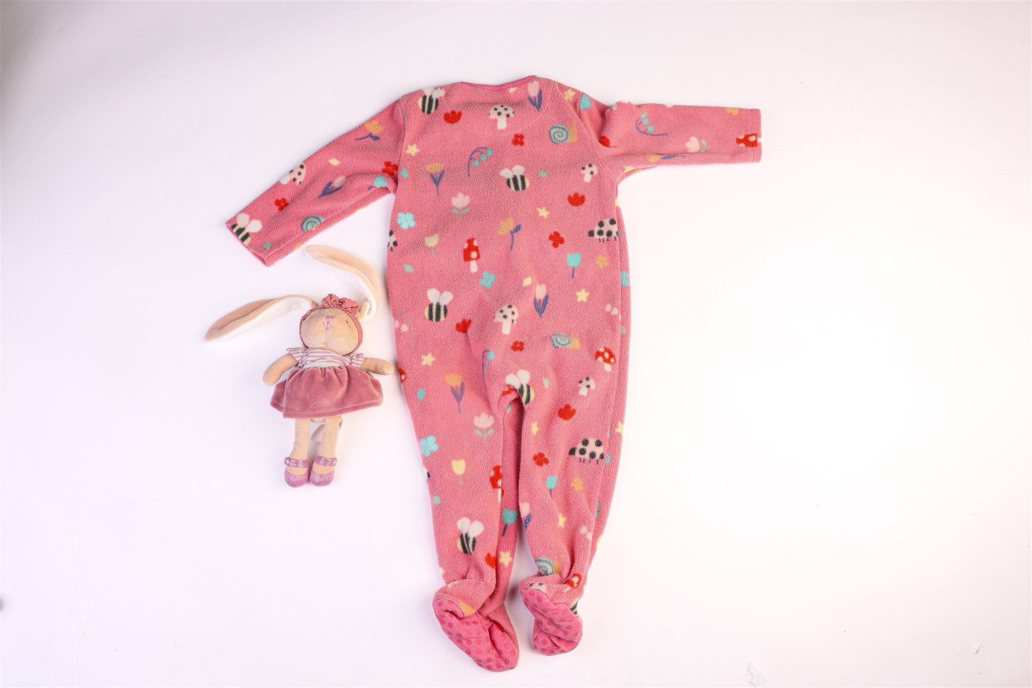 Pink sleepsuit with mushrooms, bees, ladybugs, flowers