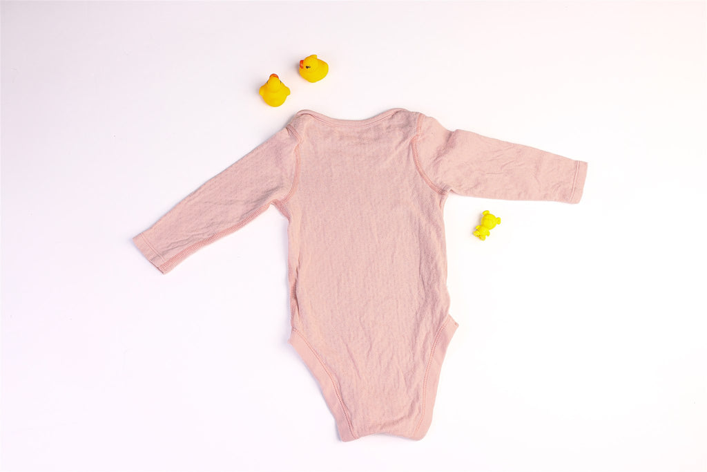 Pink long-sleeved bodysuit