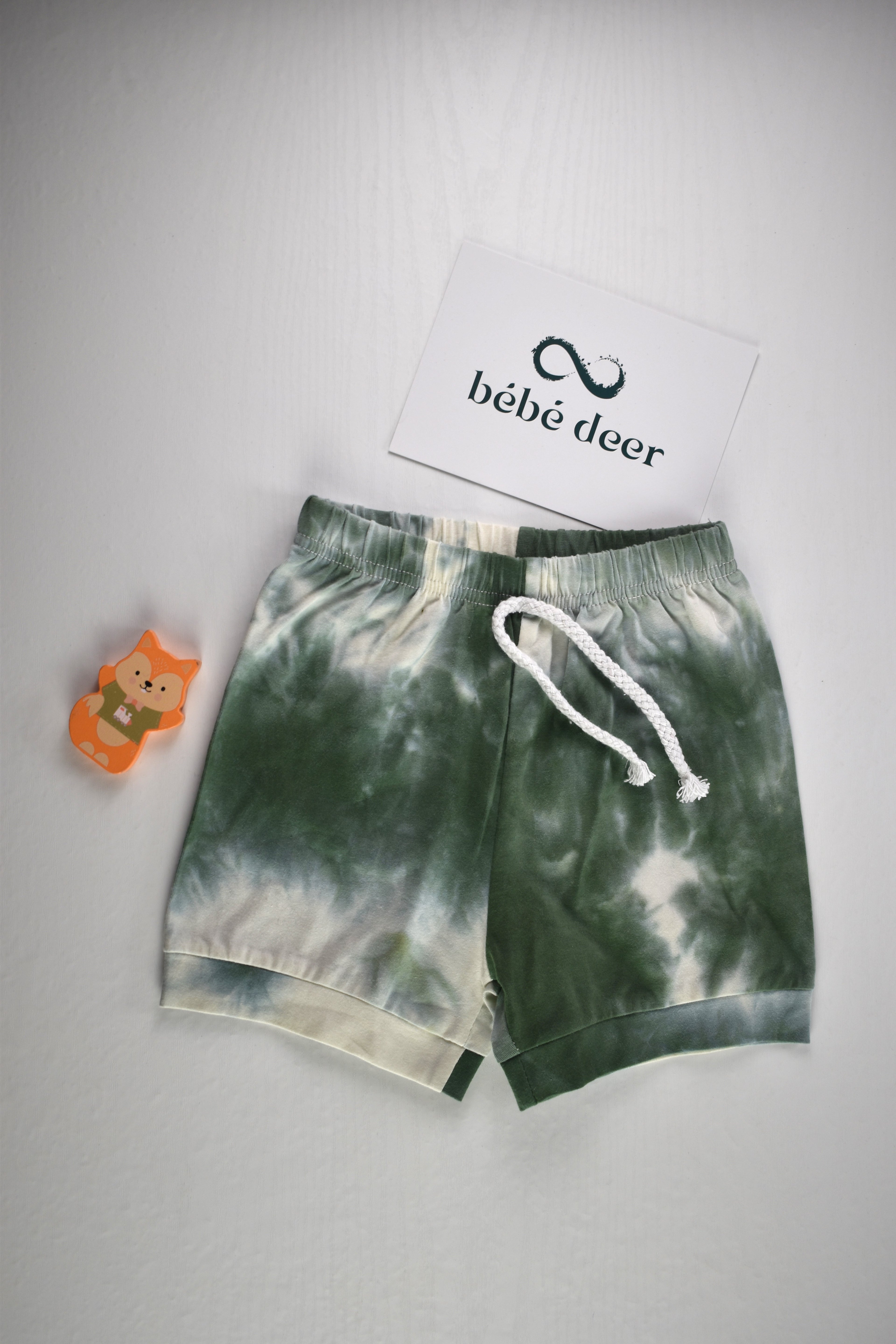 Green and white pattern shorts