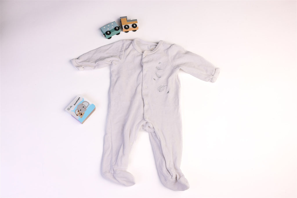 White skeepsuit with feathers