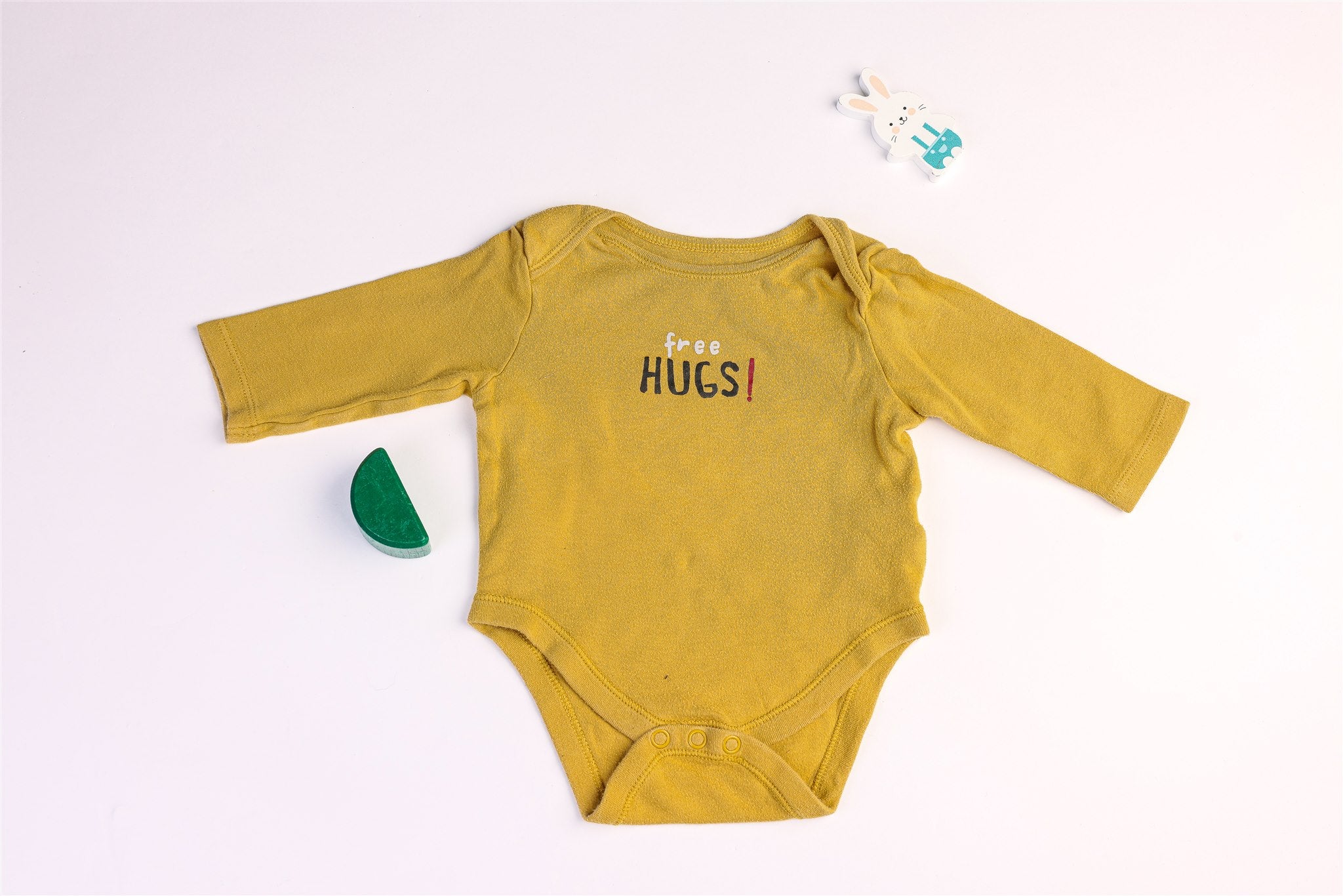 Mustard "Free Hugs!" long-sleeved bodysuit