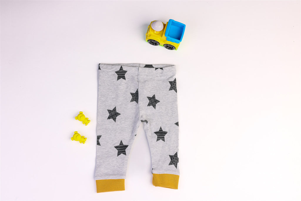 Grey trousers with black stars