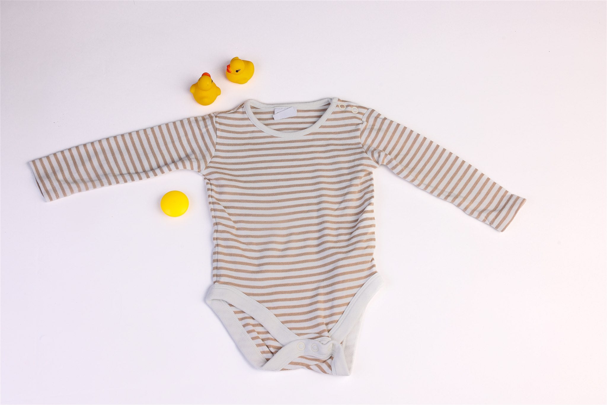 Striped bodysuit with snaps between the legs and on the shoulder