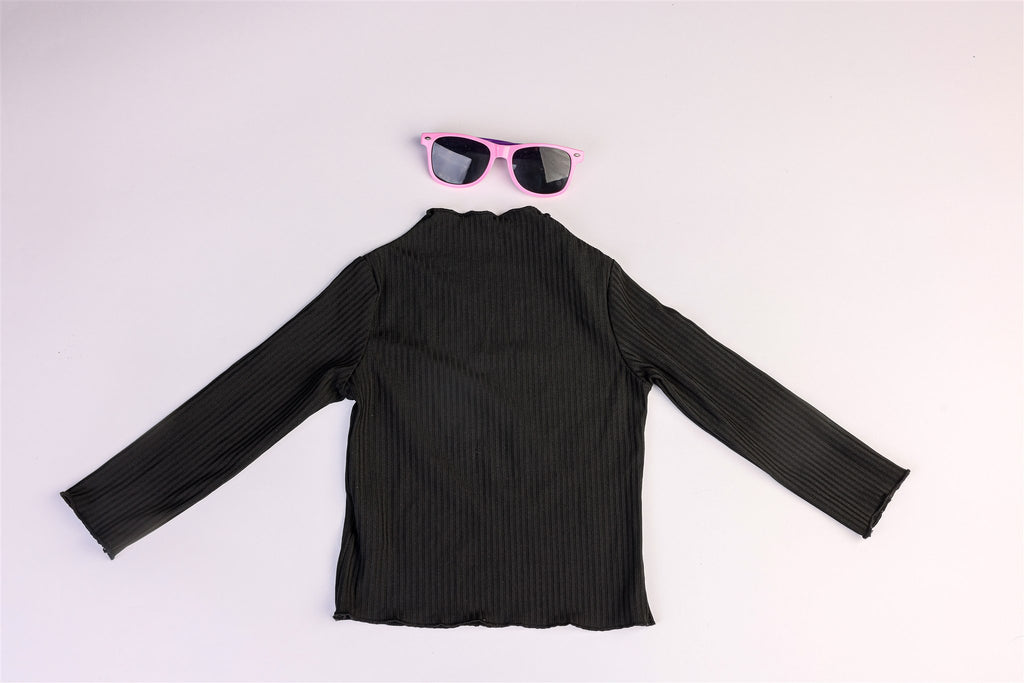 Black top with slightly ruffled collar