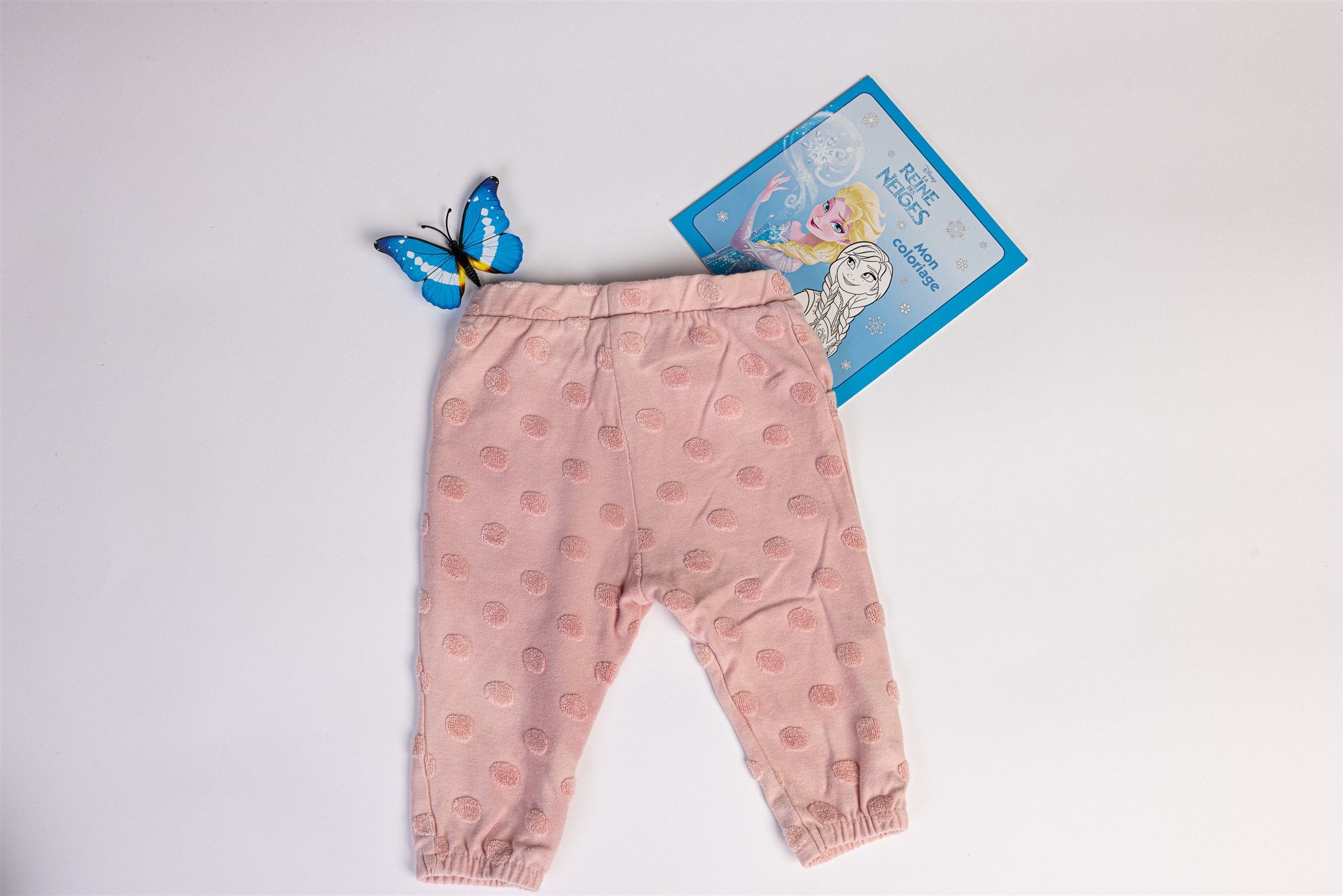 Pink trousers with raised polka dots