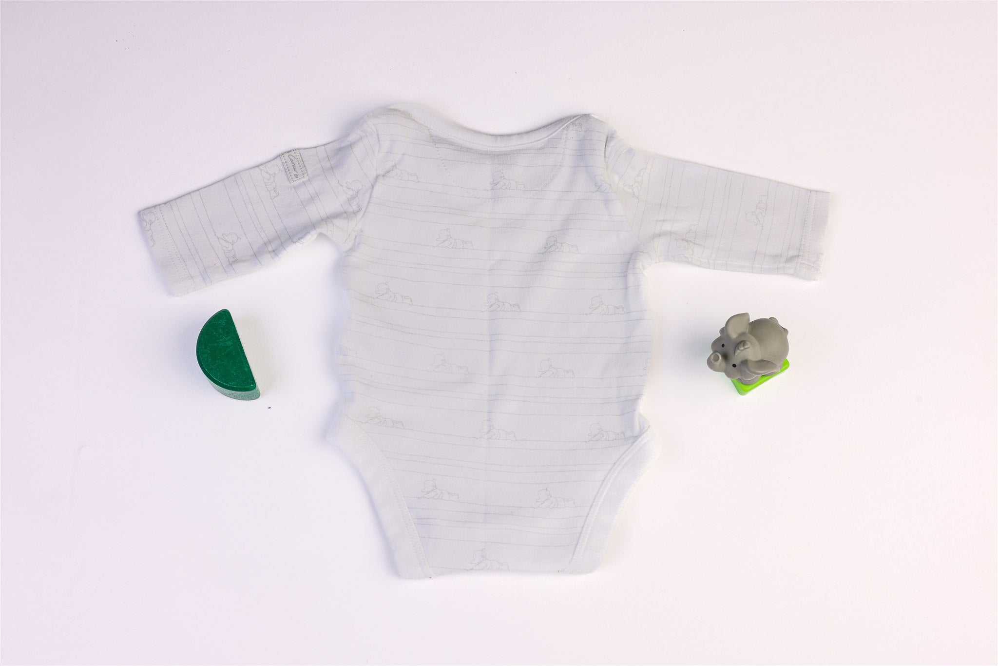 White bodysuit with small elephants