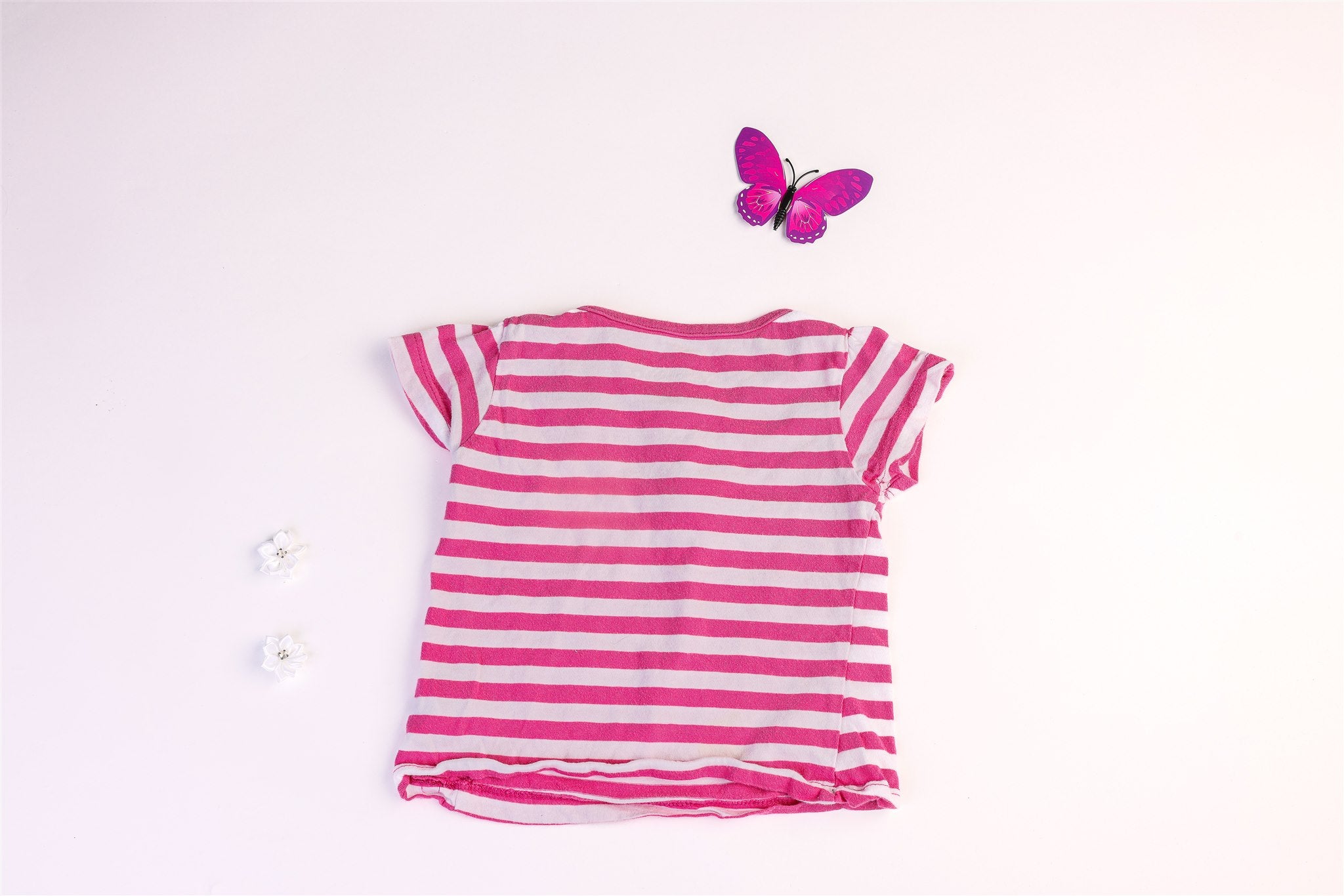 Pink striped top with bow and rhinestones
