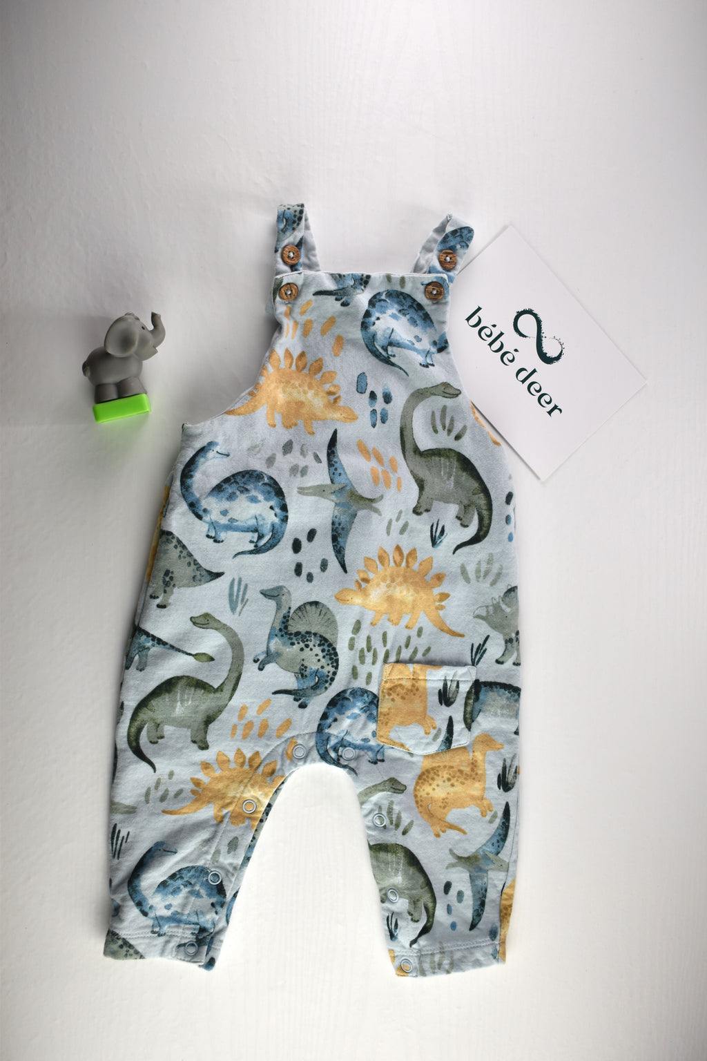 Dungarees with an all-over dinosaur print