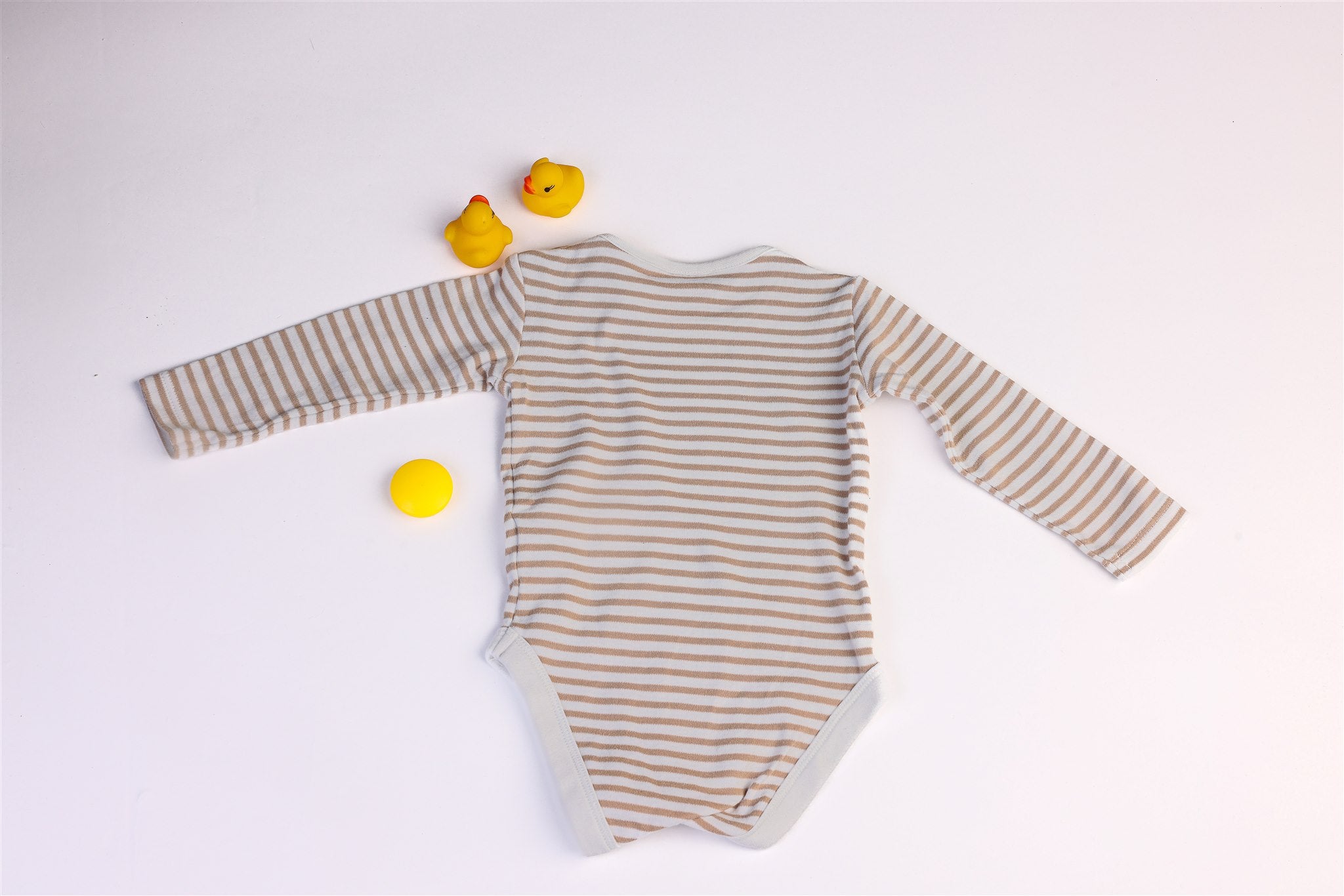 Striped bodysuit with snaps between the legs and on the shoulder