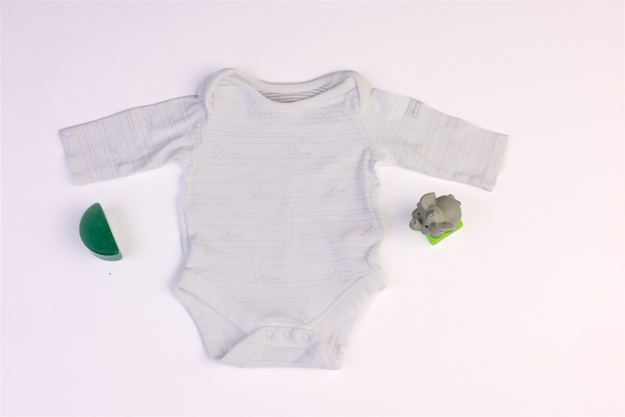 White bodysuit with small elephants