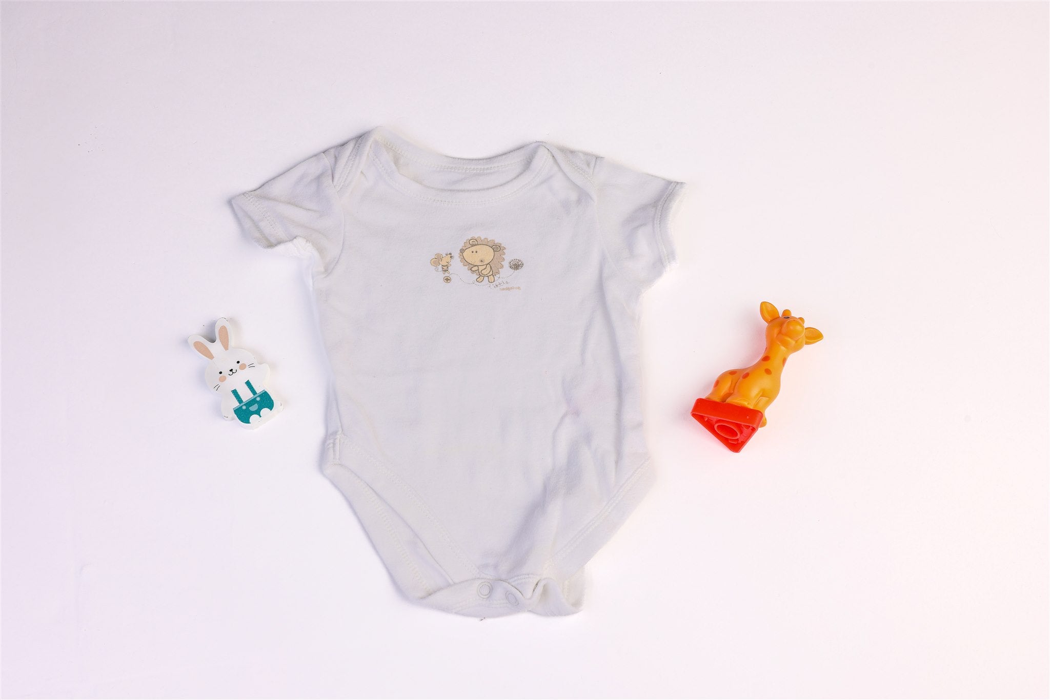 White bodysuit with lion and mouse print