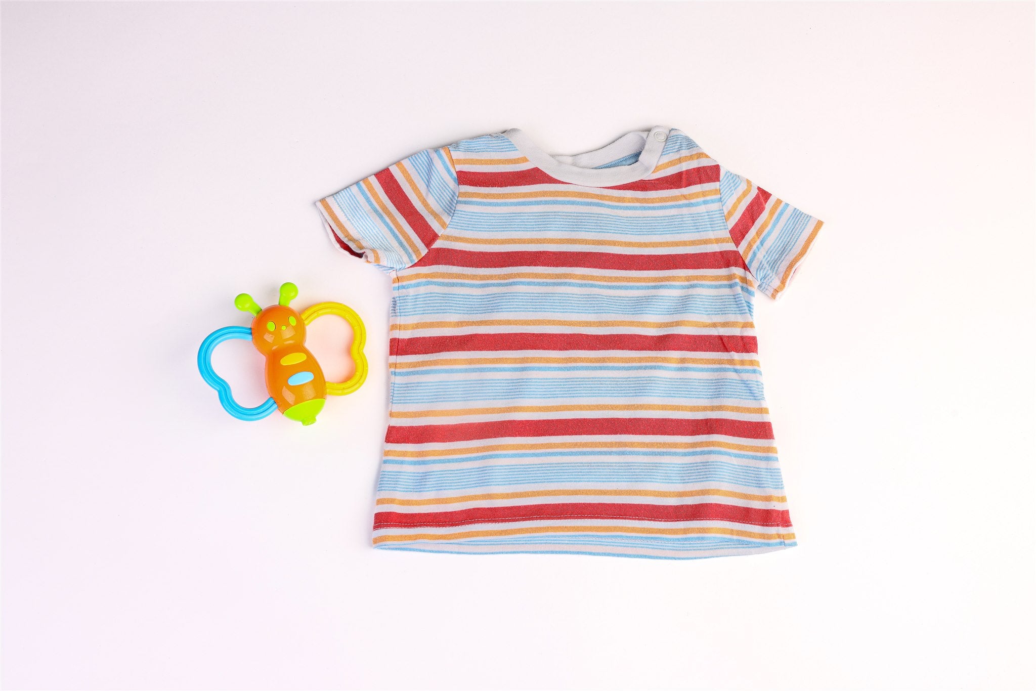 Blue, orange, and red striped top