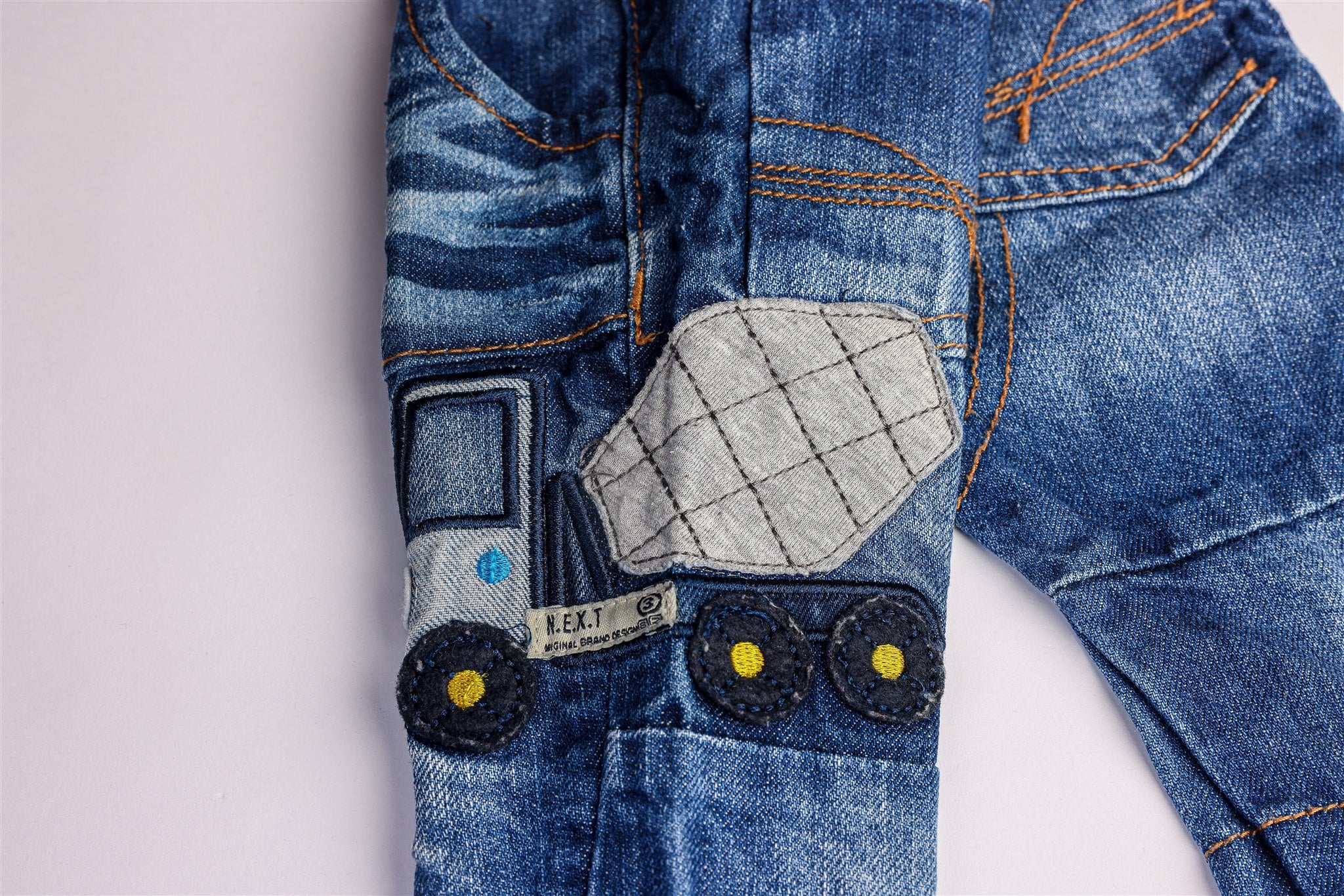 Jeans with side truck detail