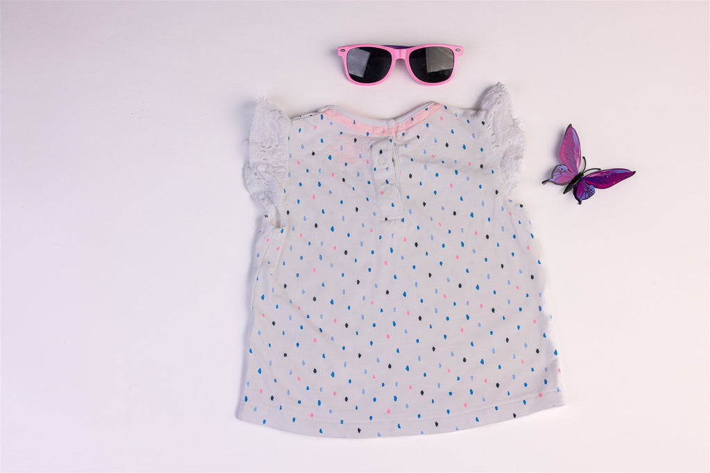 White dotted top with lace-effect sleeves